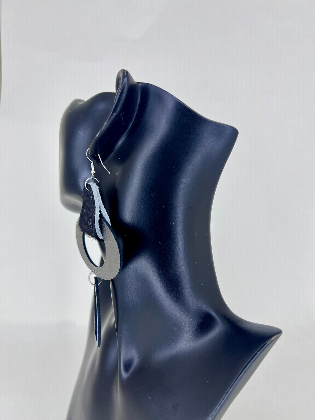 Discover SP Luxe Jewelry’s denim and leather statement earrings, handcrafted with bold texture and layered contrast for modern, artistic style.