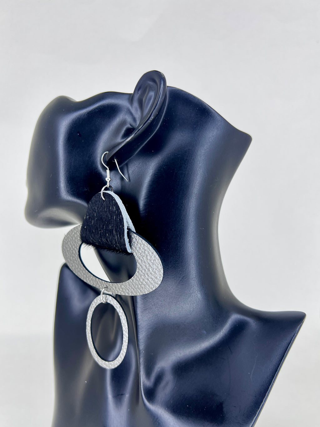 Discover SP Luxe Jewelry’s denim and leather statement earrings, handcrafted with bold texture and layered contrast for modern, artistic style.