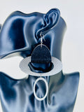 Discover SP Luxe Jewelry’s denim and leather statement earrings, handcrafted with bold texture and layered contrast for modern, artistic style.